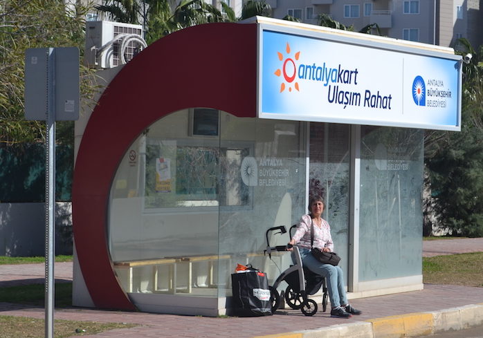 Waiting for the bus in a wheelchair 