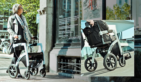 Lady walking with a rollator and being puched in a sheelchair