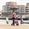 Young woman walking under the Rollz Flex umbrella