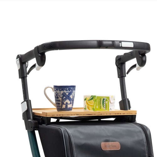 A tray placed on a Rollz Flex rollator to help carry food from one room to another